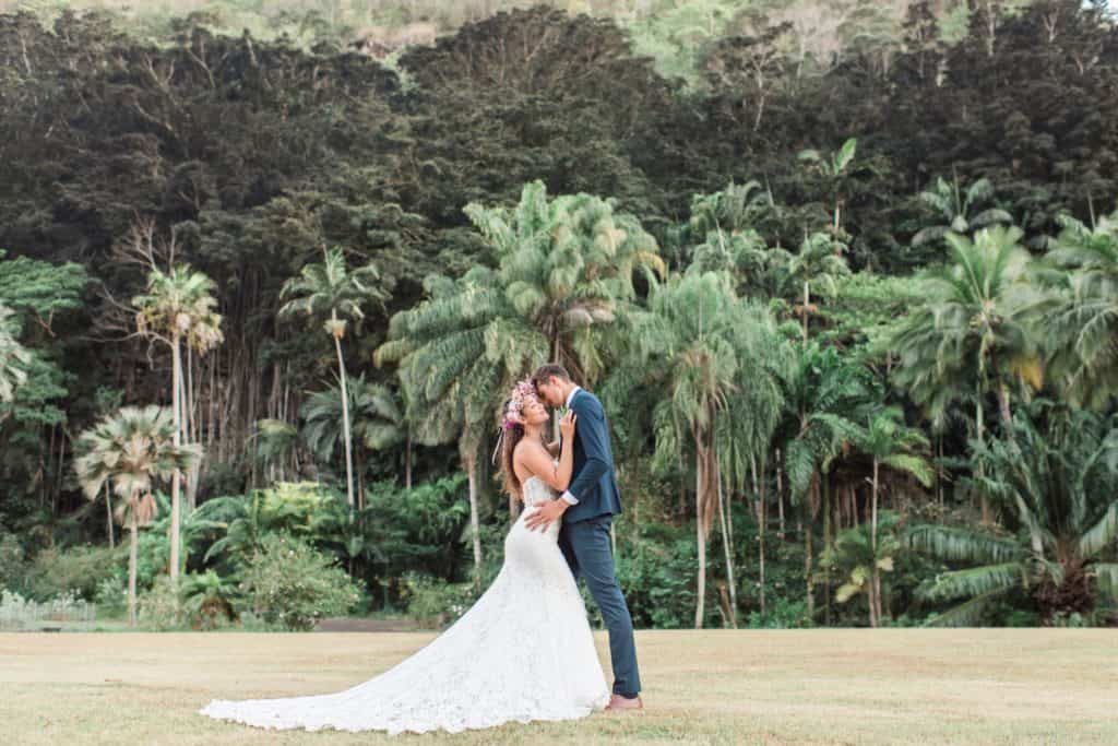 wedding day at waimea valley with palm trees