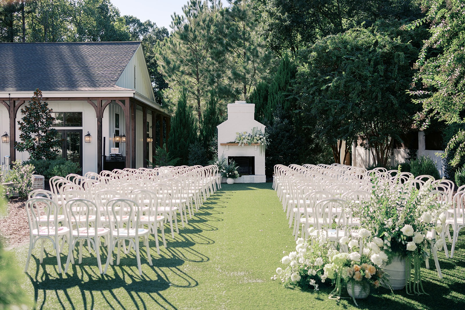 garden ceremony setup for a lesbian wedding at the bradford in new hill nc