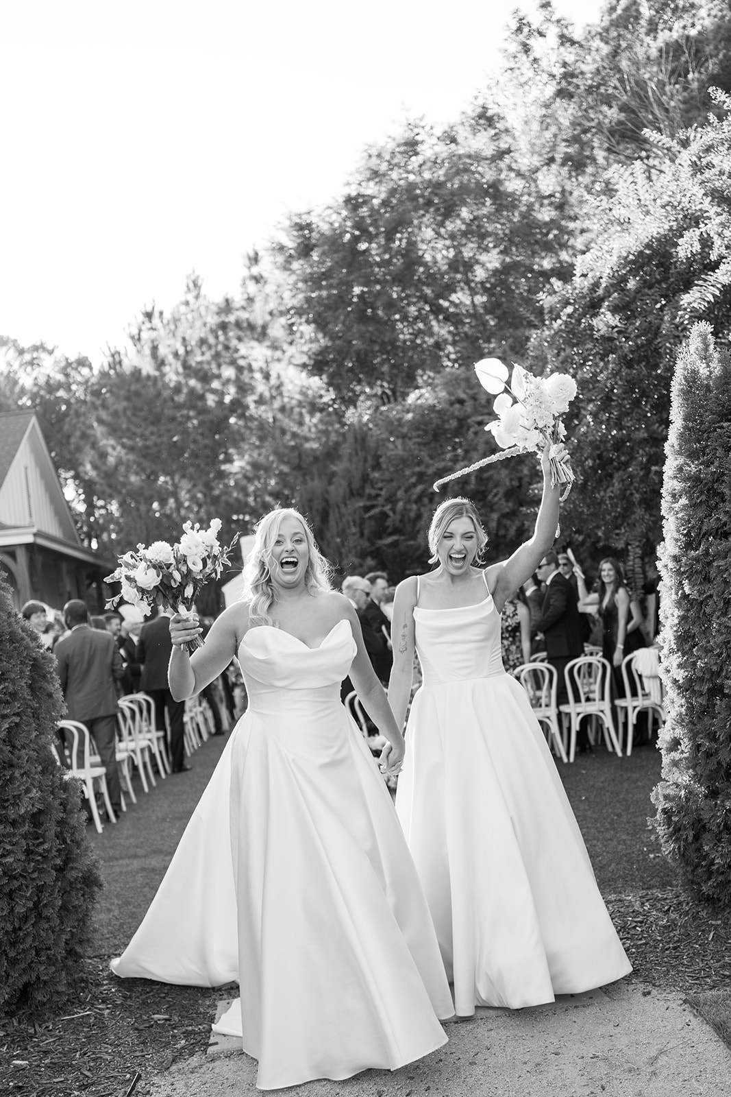 black and white ceremony exit with snap fans at the bradford
