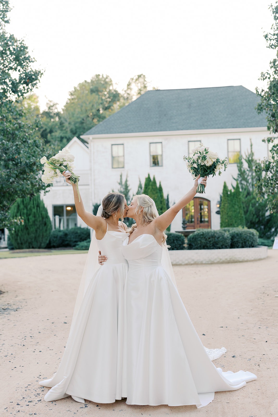 two brides celebrating at golden hour